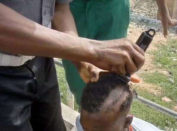PHOTOS: Borno Hisbah shaves off youths' hair over 'anti-moral' hairstyles